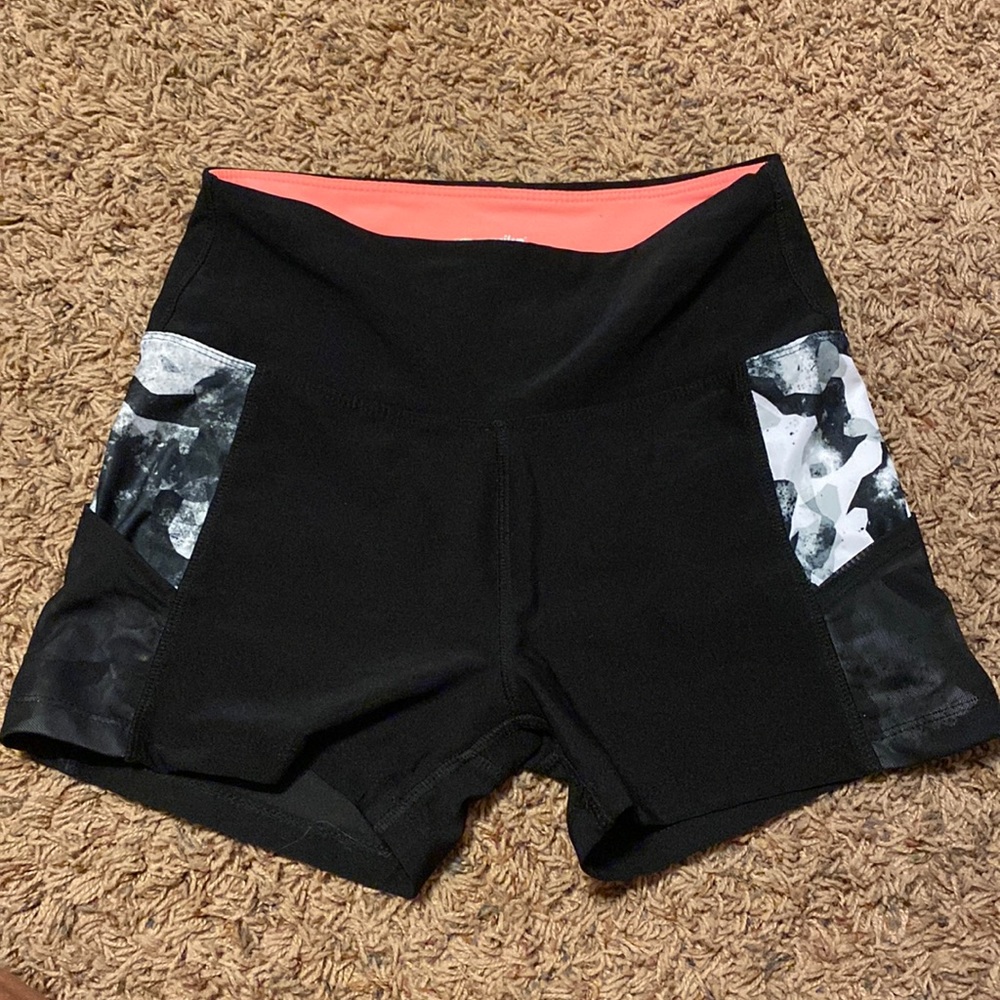 Pink and black biker shorts